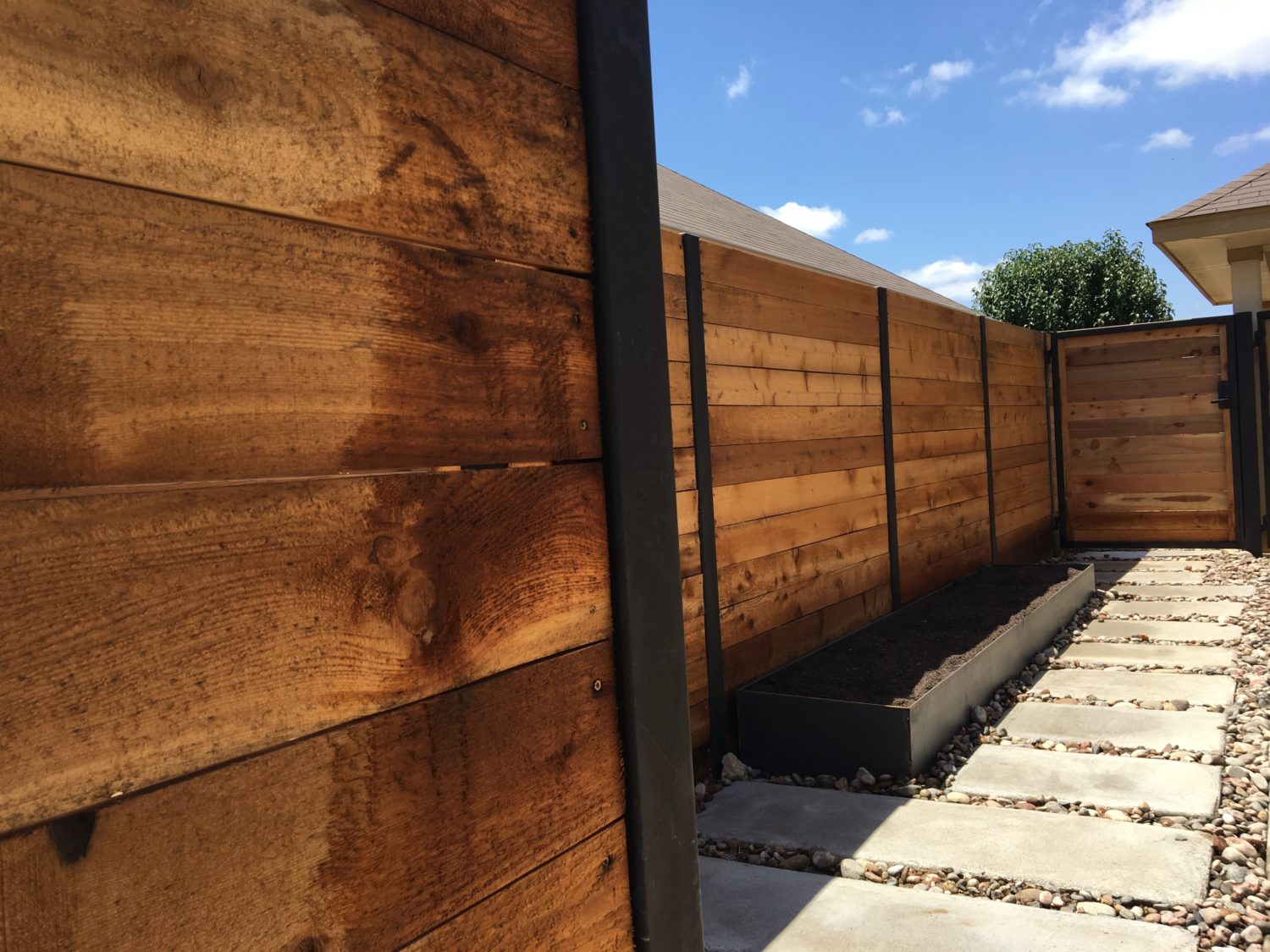 Austin landscape and design - steel planters and cedar fence