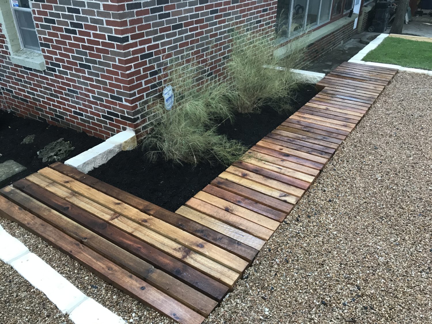 Austin landscape and design - cedar bench and boardwalk