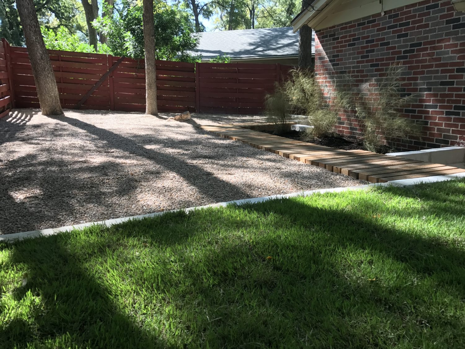 Austin landscape and design - cedar bench and boardwalk