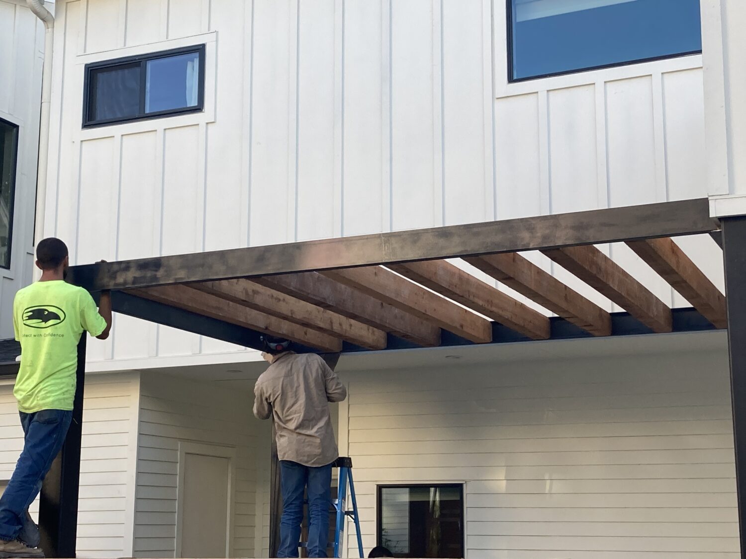 Austin landscape and design - steel paragola with cedar beams