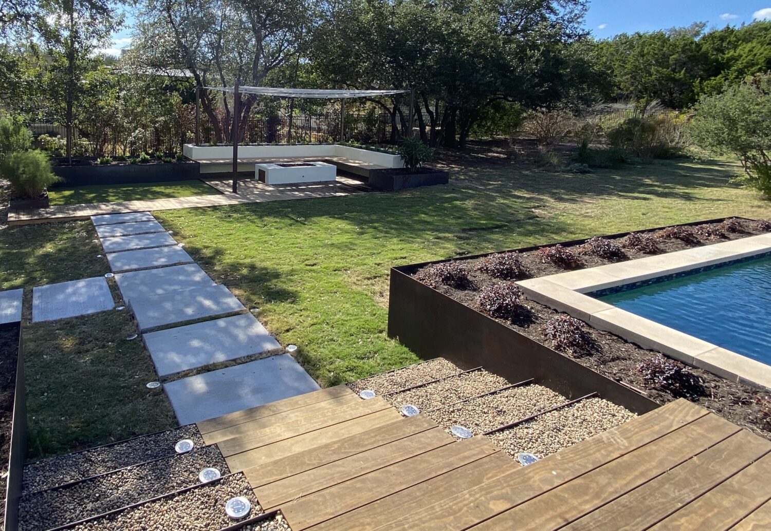 Austin landscape and design - planters wrap, upper pool patio